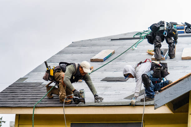 Professional Flat Roof Repair technician working in Utica, OH